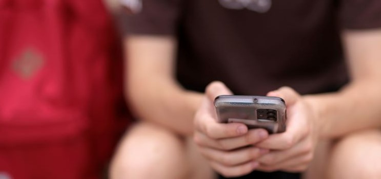 Young man with phone
