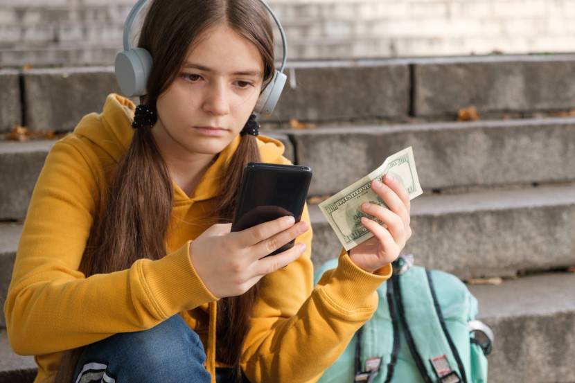 young girl buying something online