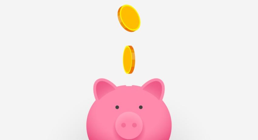 Pink piggy bank and gold coins falling into it. Concept of money saving, business investment, family budget and financial planning, careful income distribution