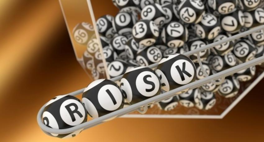 Bingo Balls with Risk caption
