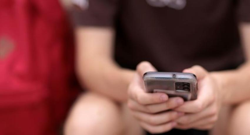 Young man with mobile phone