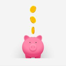 Pink piggy bank and gold coins falling into it. Concept of money saving, business investment, family budget and financial planning, careful income distribution